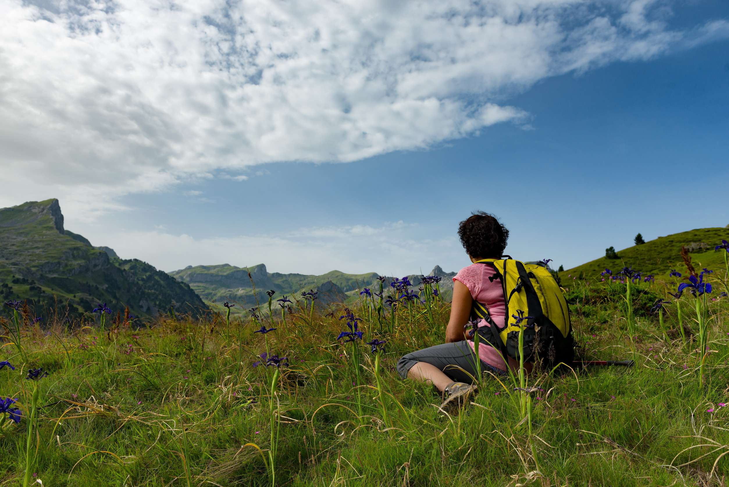 A Hiker Woman Resting In The Mountain