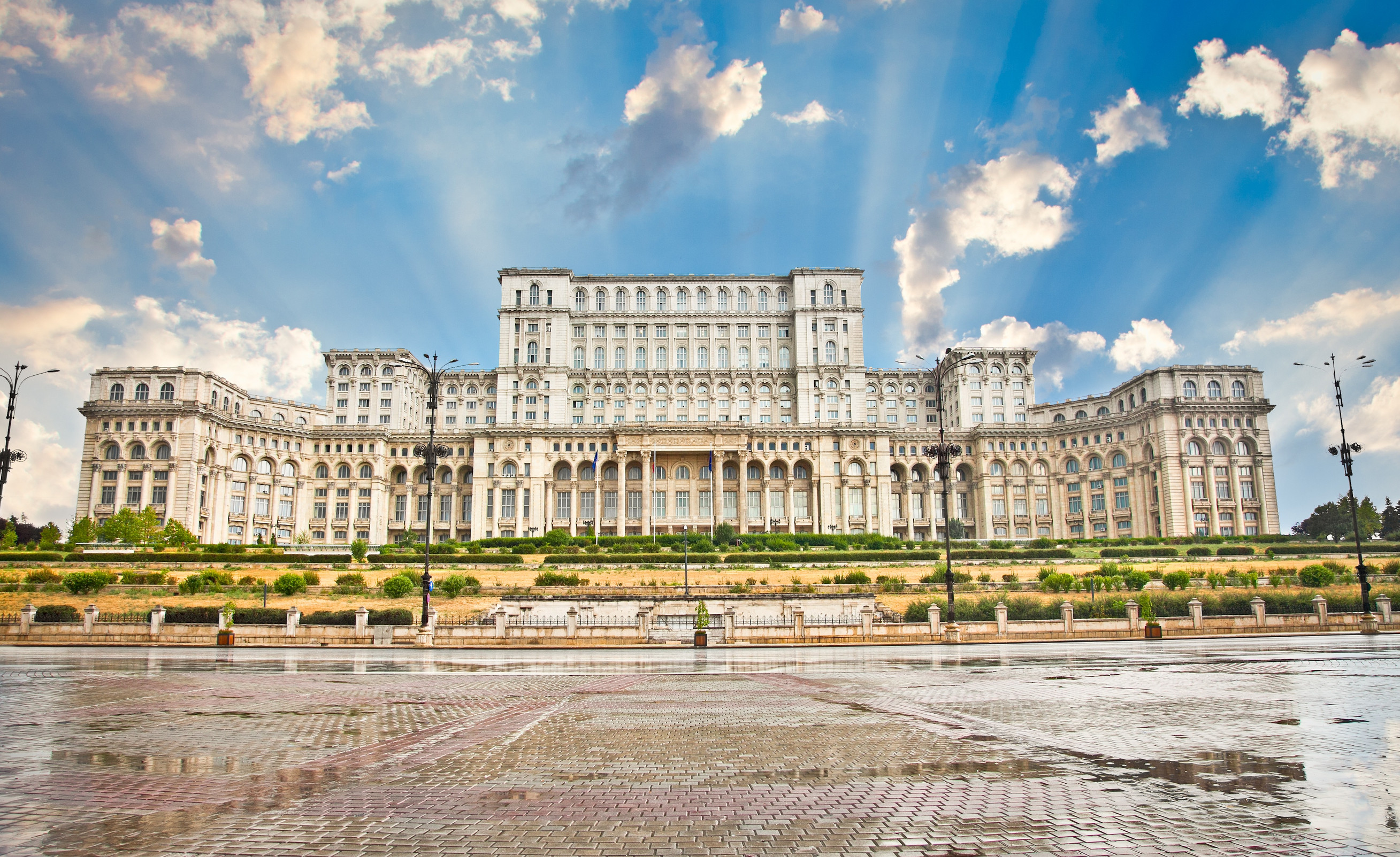 Sightseeing bus leaves from the Palace of the Parliament