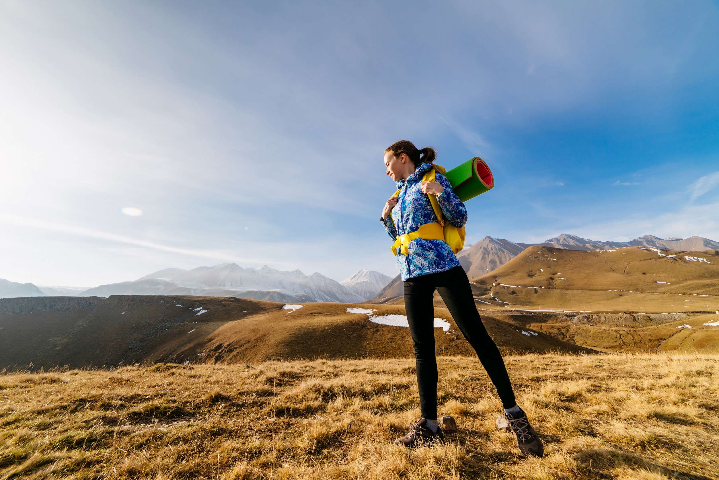 Active Young Girl In A Blue Jacket Loves Sports Tourism Travels Along The Caucasian