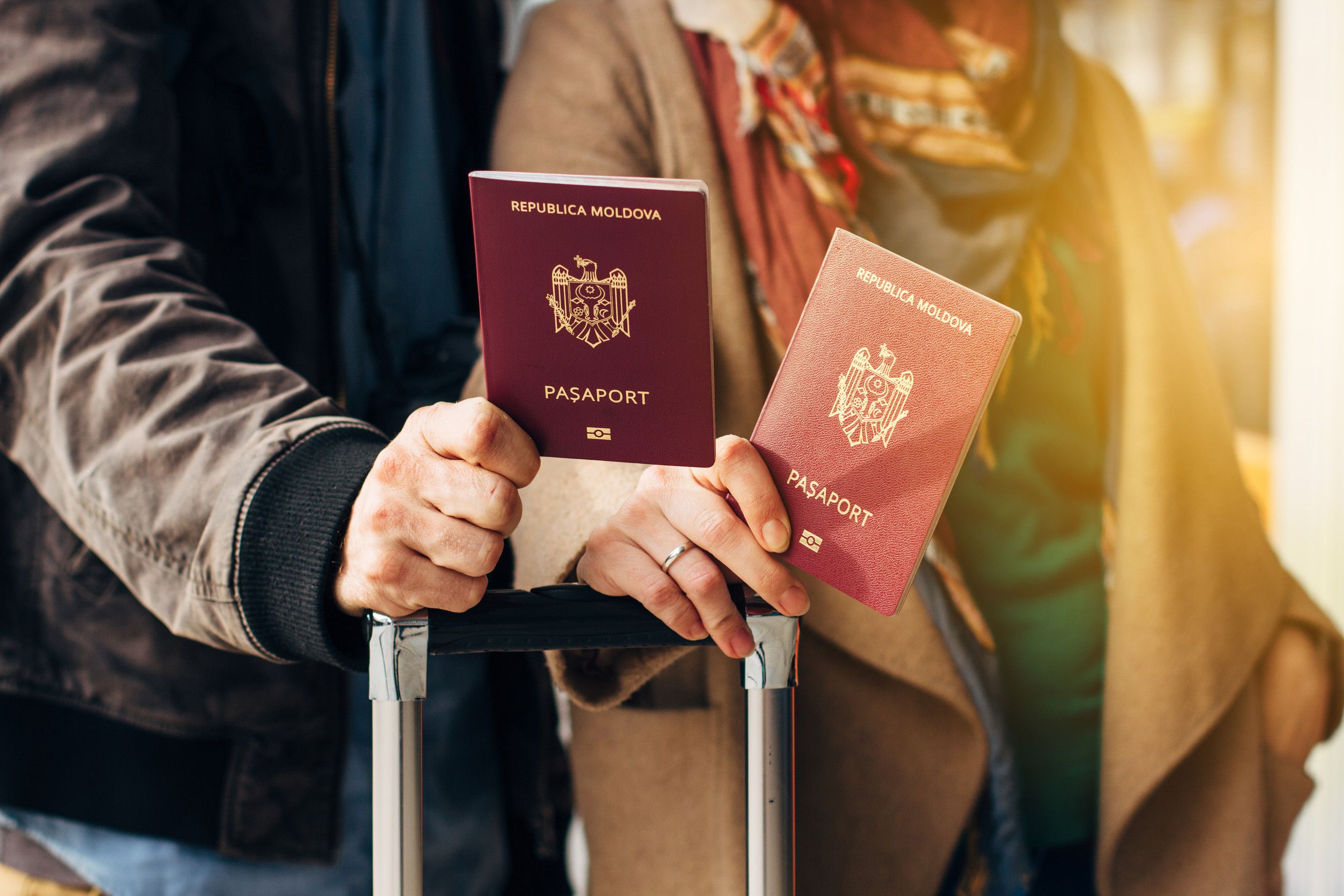 Couple Hand Holding Passport Traveler With Luggage Travel Concept