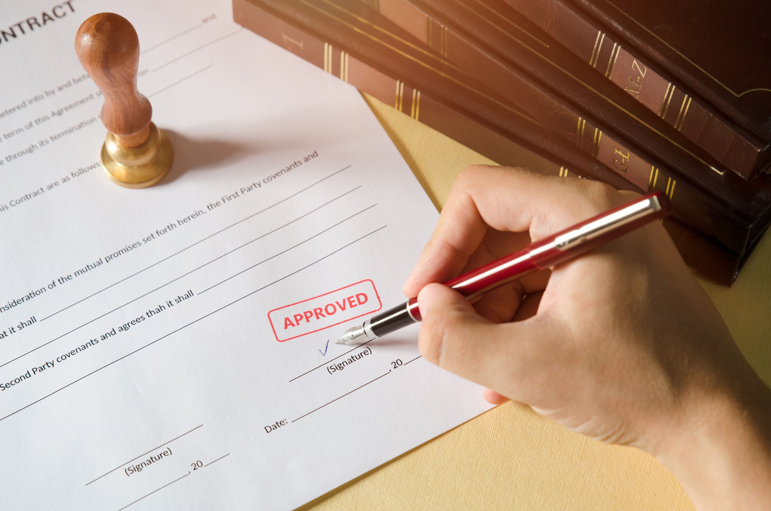 Notary Signing A Contract With Fountain Pen Red Approved Stamp Business Man Law
