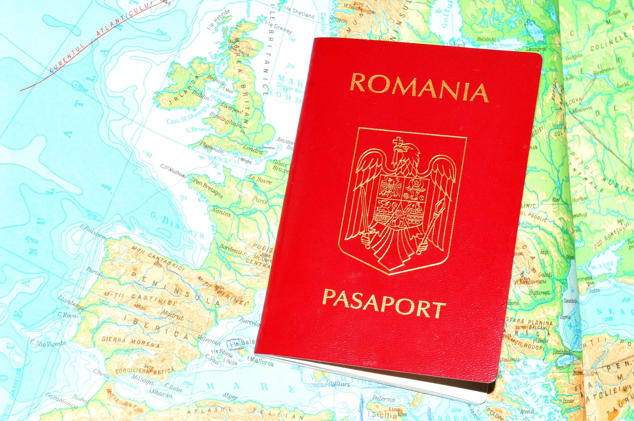 Romanian Passport With Currency On Europe Map Romanian Passport With Currency On Europe Map