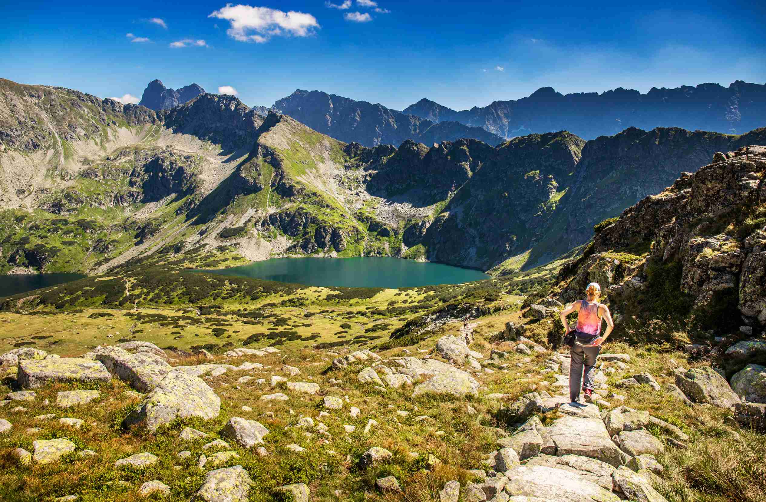 Tourist And Hiker On Trail In High Mountains Activity In Alpine Style Scenery High Tourist And Hiker On Trail In High Mountains Activity In Alpine Style Scenery High