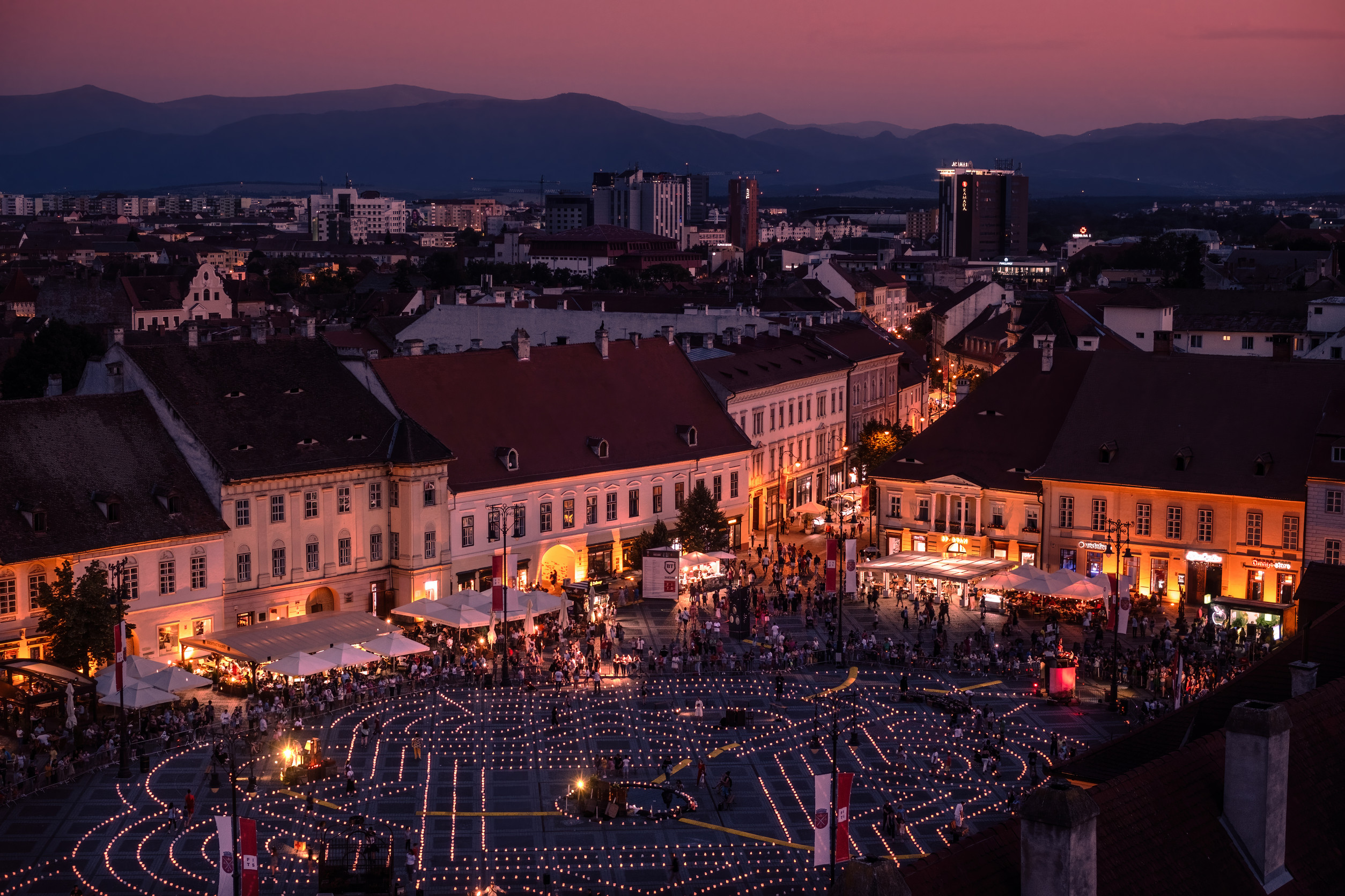 People passing by on a pedestrian walkway during Sibiu International Theatre Festival, Sibiu, Romania