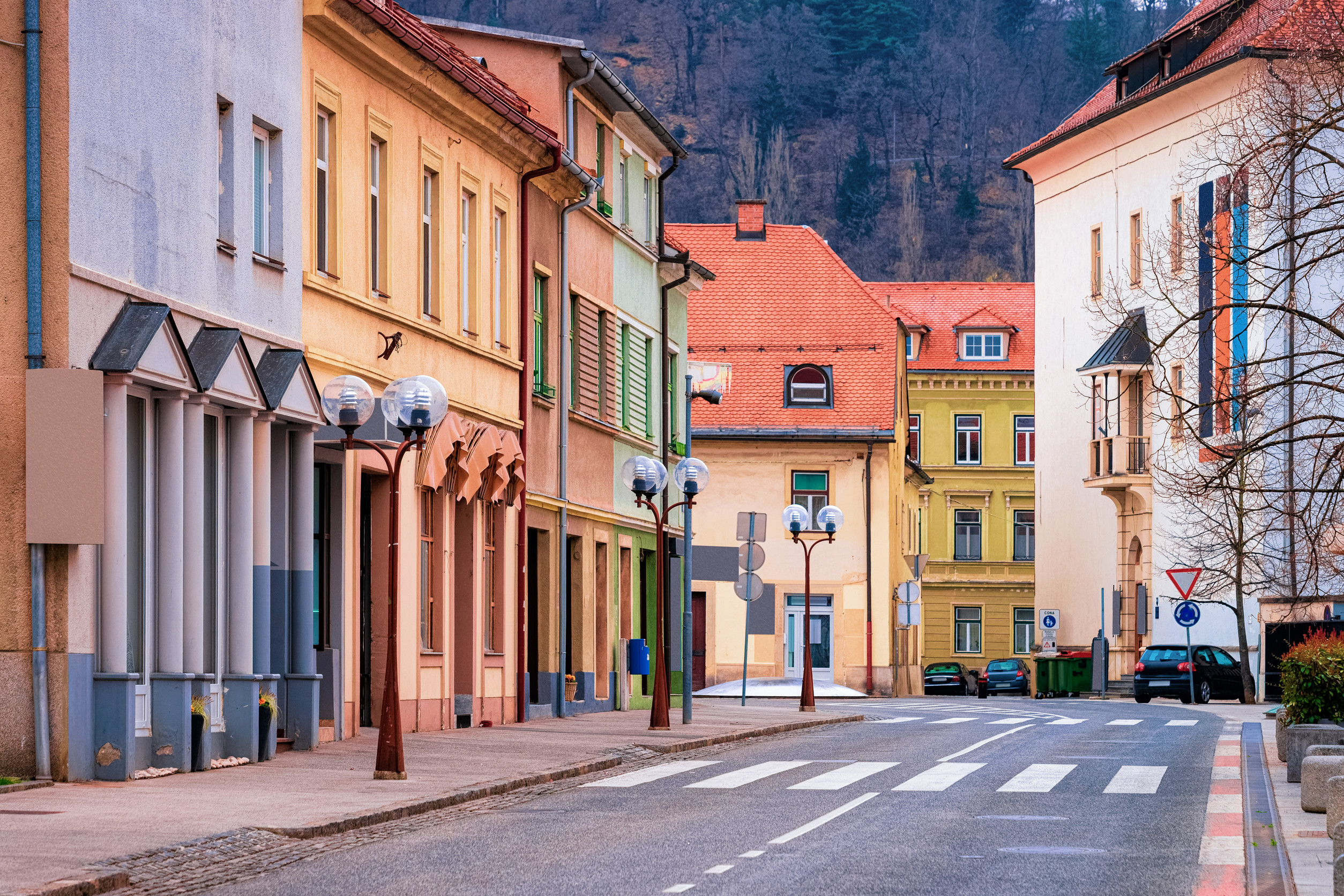 Tourists walk along beautiful street of old town Brasov