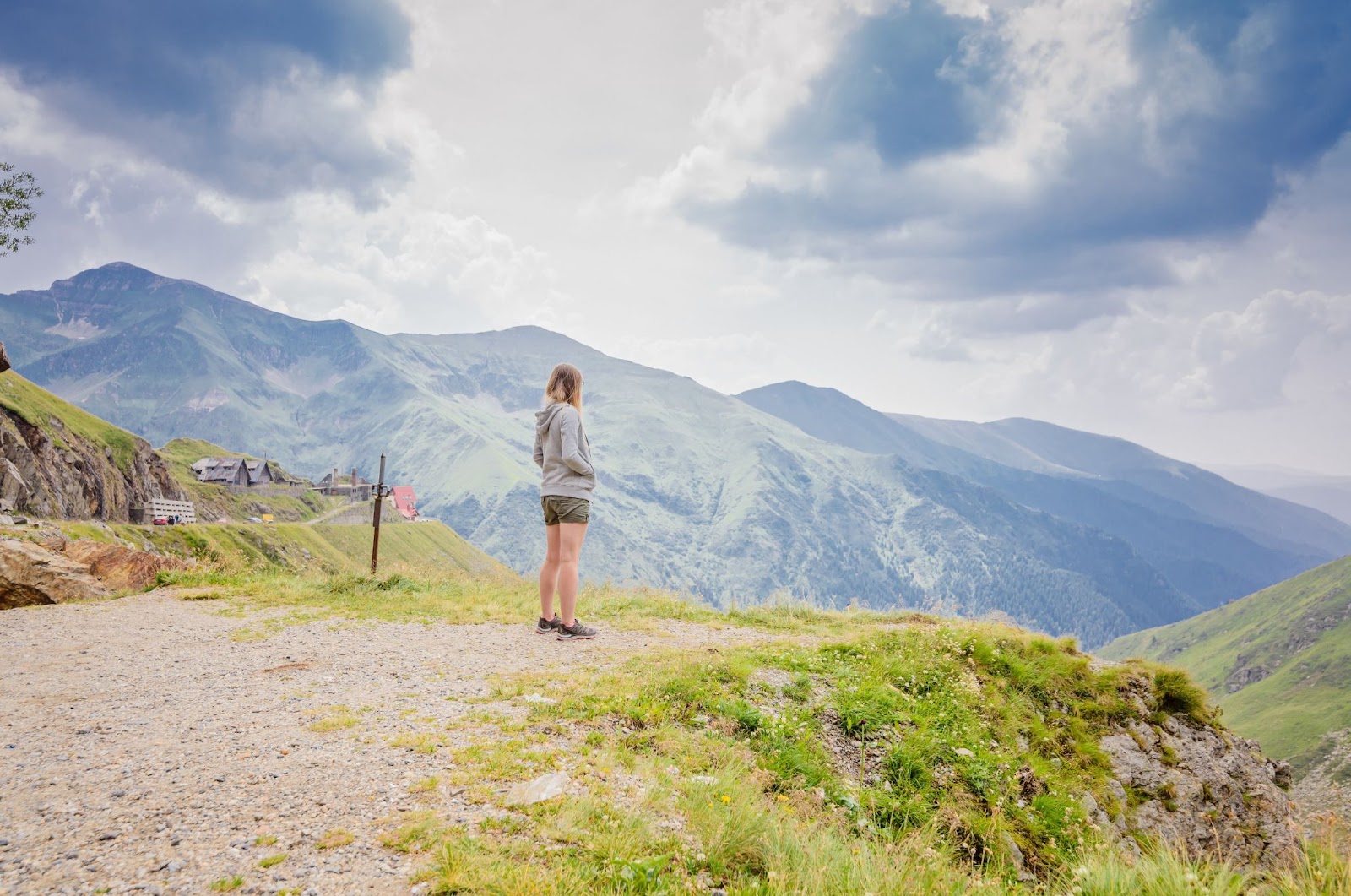 Young woman on cliff